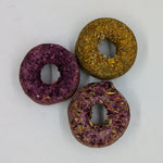 Donut shaped hay and herbs treat and chew for rabbits, guinea pigs, chinchillas, and other pet rodents